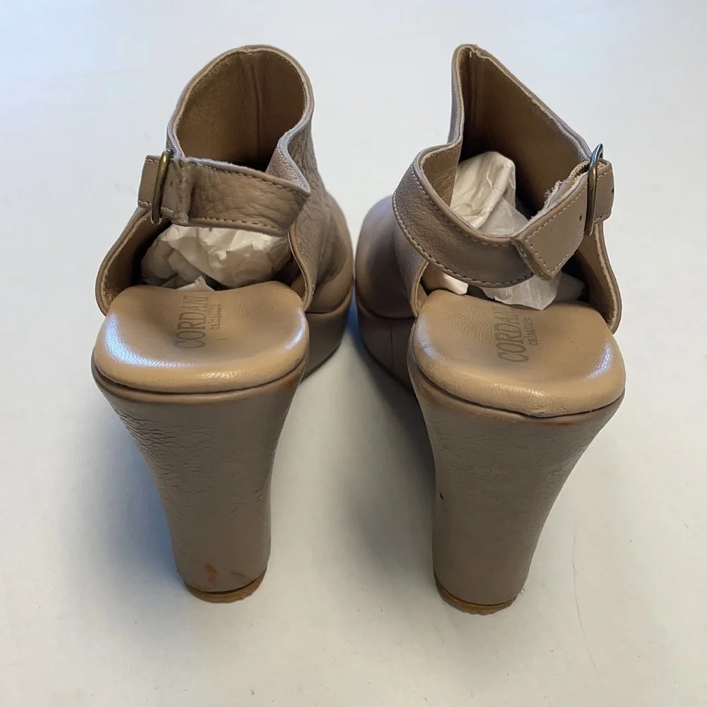 Cordani peep toe leather wedges